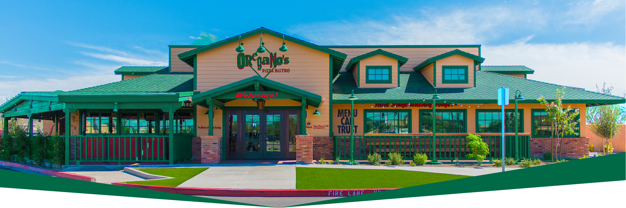Oregano's Queen Creek storefront and outdoor seating, showing the restaurant's inviting atmosphere.